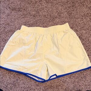 Light Yellow Women's Athletic Shorts with Blue Trim